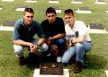 Airforce Association NSW 2AFDS photo gallery - 1992 - LAC Adam Fletcher, LAC Steve Patterson and LAC Colin Weekes - Airfield Defence Guards (ADGs) of No. 2 Airfield Defence Squadron (2AFDS) - at the gravesite of LAC Thomas Irvine in the Labuan War Cemetery. LAC Irvine was a Guard (predecessor musterin